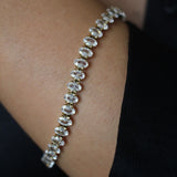 The Iconic Golden Tennis Bracelet