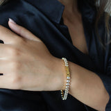 The Iconic Golden Tennis Bracelet