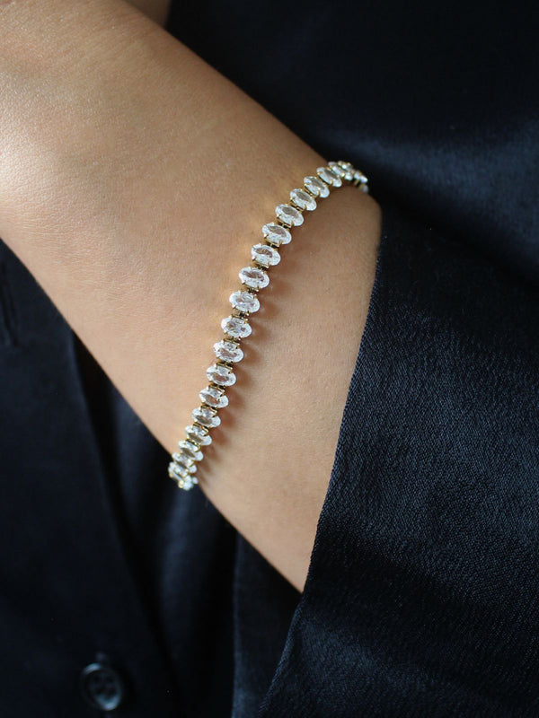 The Iconic Golden Tennis Bracelet